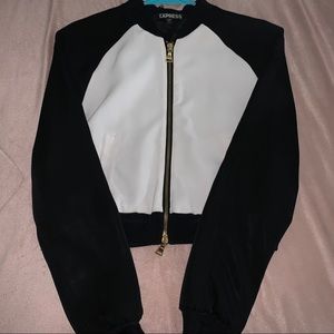 Express black with white jacket with gold details